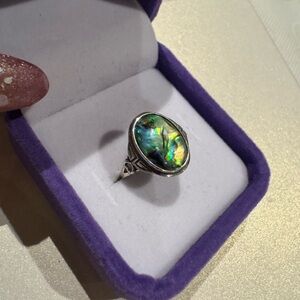 Abalone shell on 925 silver setting

Adjustable